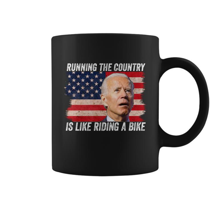 Joe Biden Falling Off His Bicycle Funny Biden Falls Off Bike V4 Coffee Mug