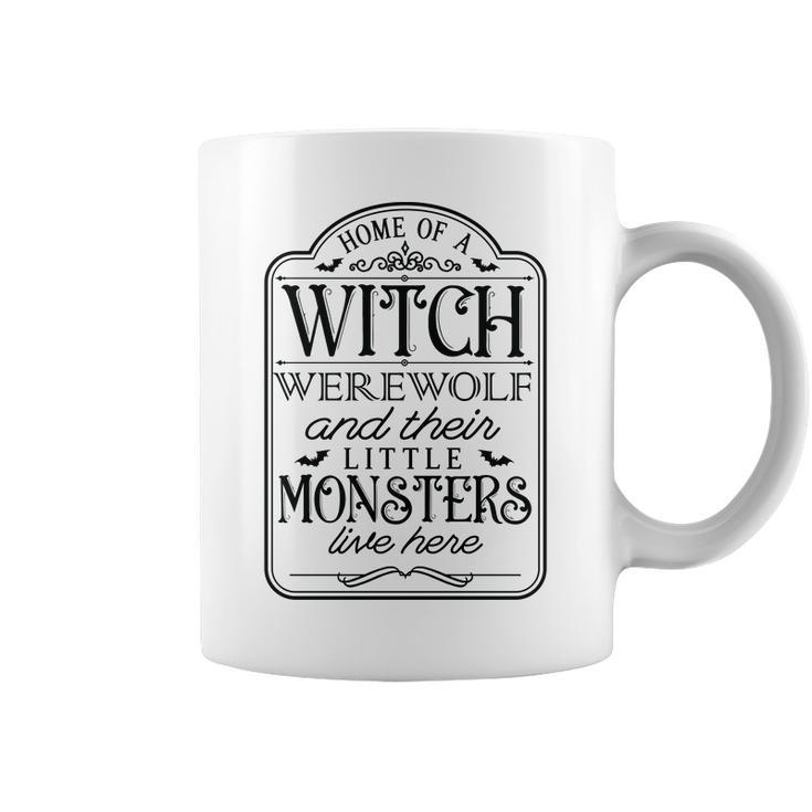 Vintage Halloween Sign Home Of A Witch Werewolf And Their Little Monster Coffee Mug