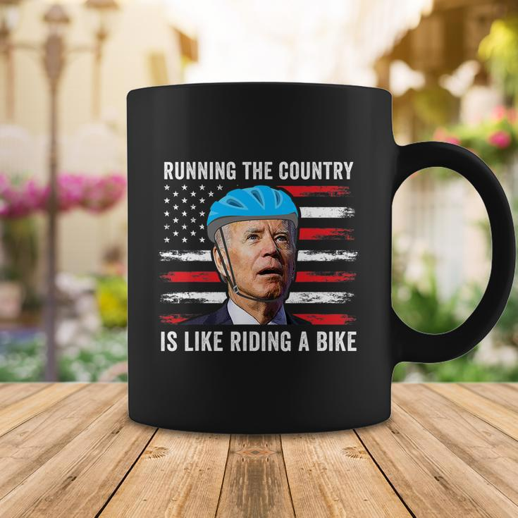 Joe Biden Falling Off His Bicycle Funny Biden Falls Off Bike America Flag Coffee Mug Unique Gifts