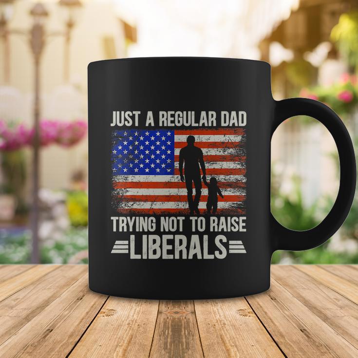 Just A Regular Dad Trying Not To Raise Liberals Fathers Day Tshirt Coffee Mug Unique Gifts