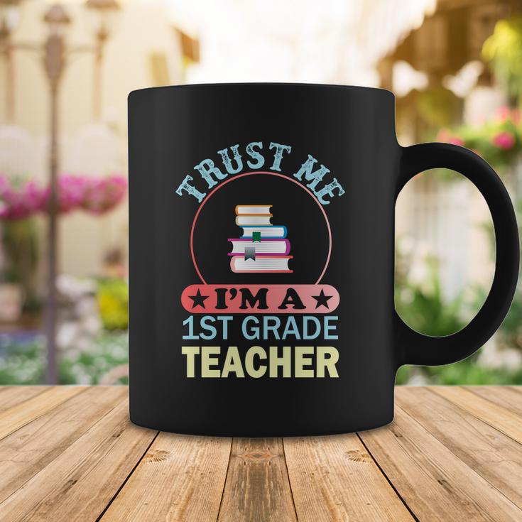 Trust Me Im A 1St Grade Teacher Funny School Graphics Plus Size Shirt Coffee Mug Unique Gifts