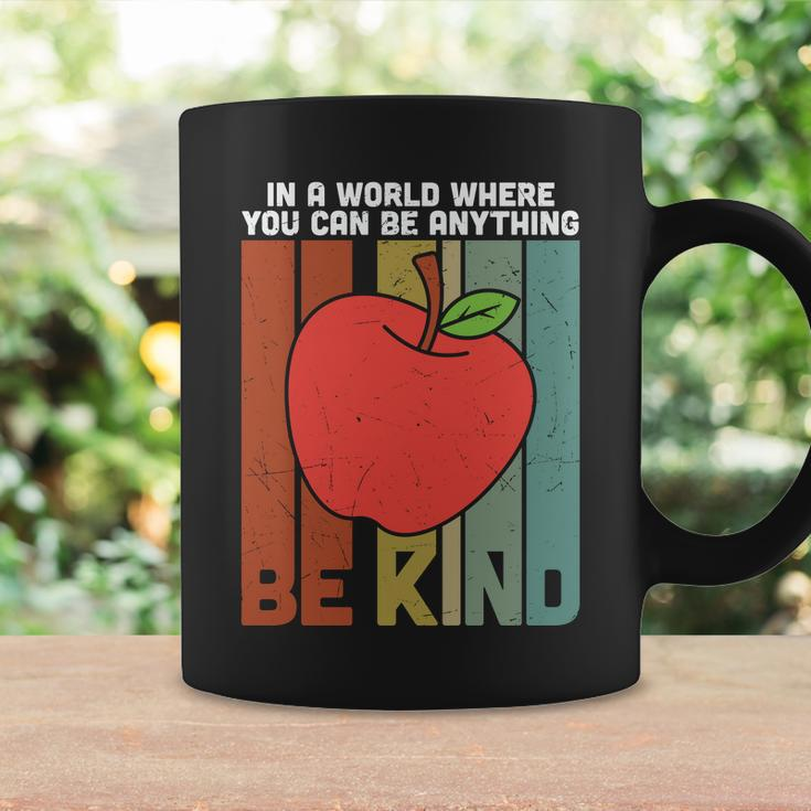 In A World Be Kind Teacher Apple Graphic Plus Size Shirt For Teacher Male Female Coffee Mug Gifts ideas