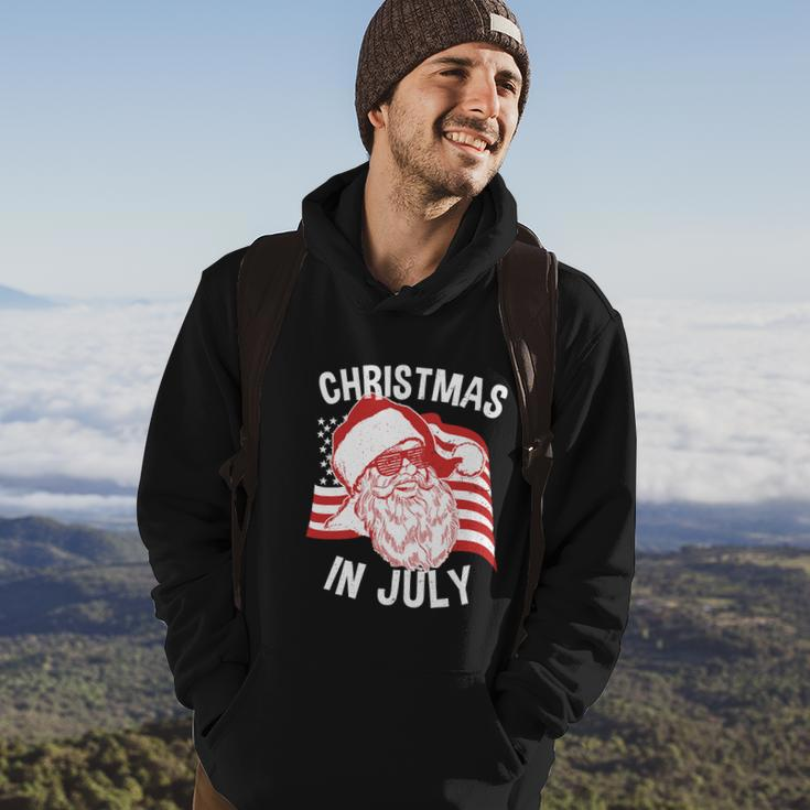 Happy Christmas In July Retro Hipster Santa 4Th Of July Hoodie Lifestyle