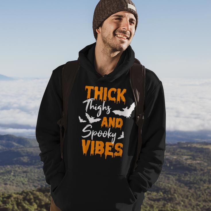 Thick Thighs And Spooky Vibes Spooky Vibes Halloween Hoodie Lifestyle