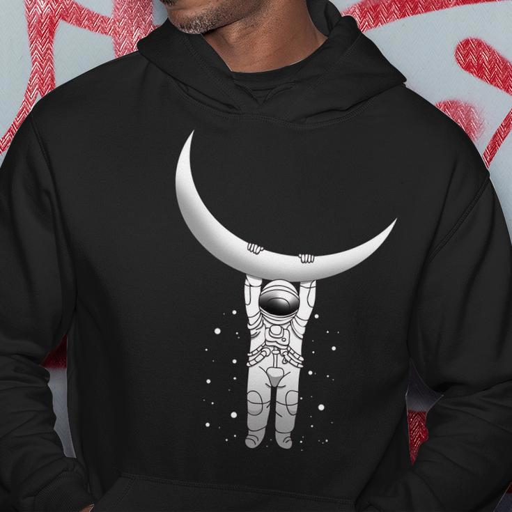 Astronaut Hanging From The Moon Tshirt Hoodie Unique Gifts