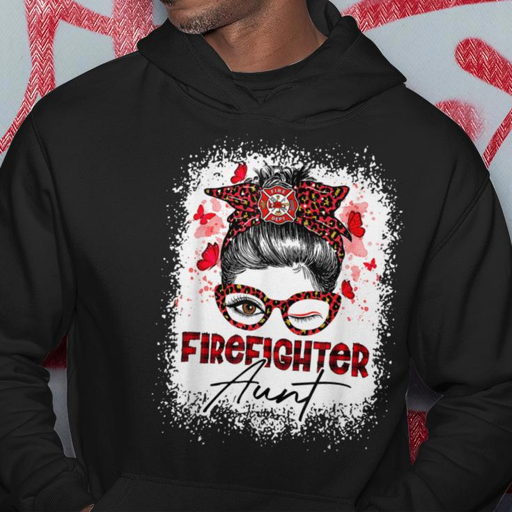 Firefighter The Red Proud Firefighter Fireman Aunt Messy Bun Hair Hoodie Funny Gifts
