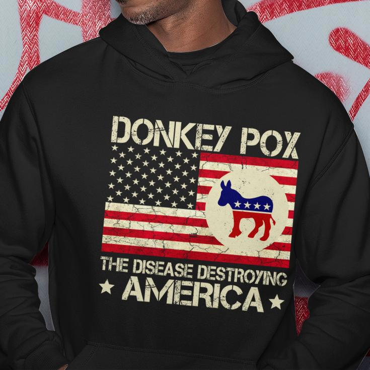 Funny Anti Biden Donkey Pox The Disease Destroying America Funny Anti Biden Hoodie Unique Gifts