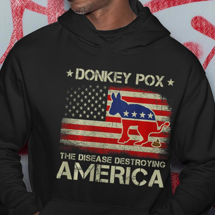 Funny Biden Donkey Pox The Disease Destroying Vintage America Flag Hoodie Unique Gifts