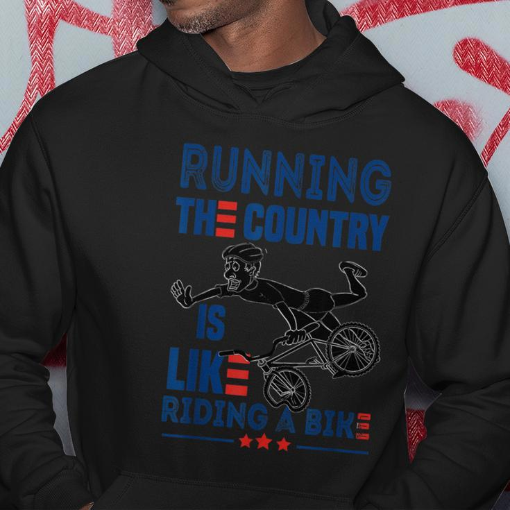 Funny Sarcastic Running The Country Is Like Riding A Bike V2 Hoodie Unique Gifts