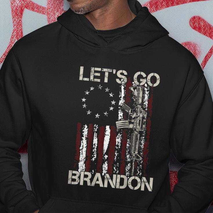 Gun American Flag Patriots Lets Go Brandon On Back Hoodie Personalized Gifts