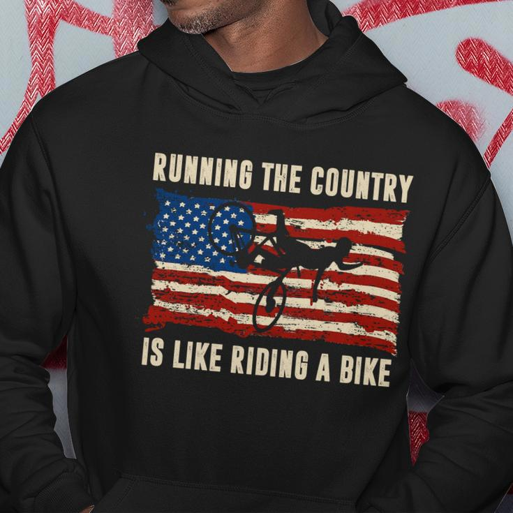 Running The Country Is Like Riding A Bike Hoodie Unique Gifts