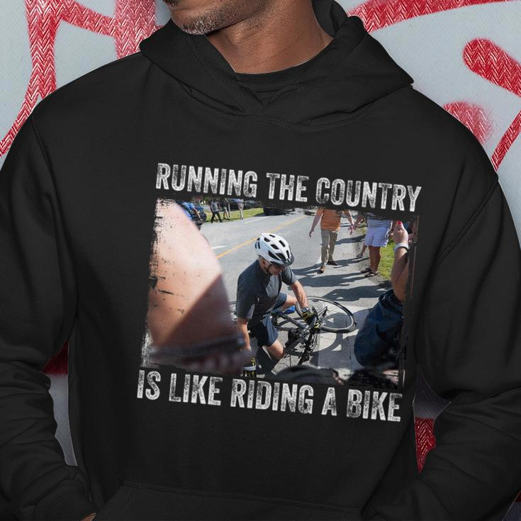 Running The Country Is Like Riding A Bike Joe Biden Funny Design Anti Biden Hoodie Unique Gifts