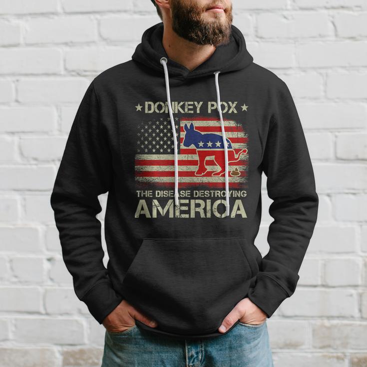 Funny Biden Donkey Pox The Disease Destroying Vintage America Flag Hoodie Gifts for Him