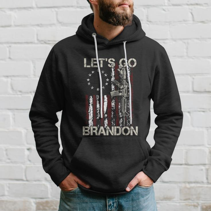 Gun American Flag Patriots Lets Go Brandon On Back Hoodie Gifts for Him
