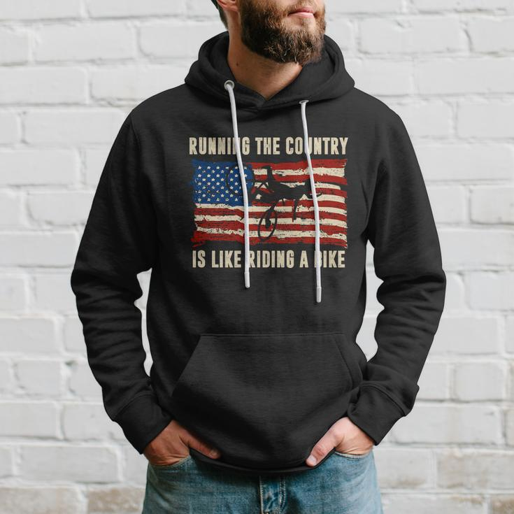 Running The Country Is Like Riding A Bike Hoodie Gifts for Him
