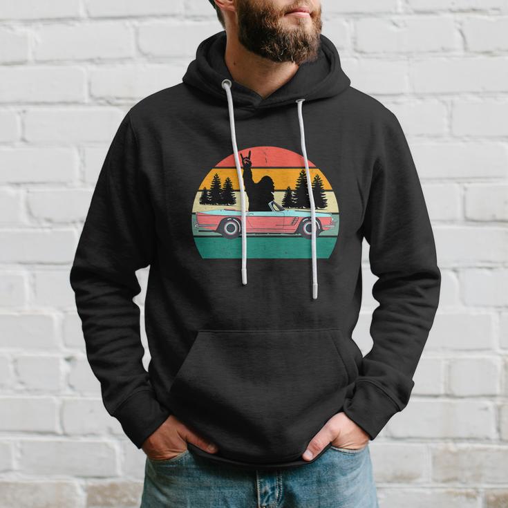 Sasquatch Bigfoot Driving Car Retro Sunset Funny Hoodie Gifts for Him