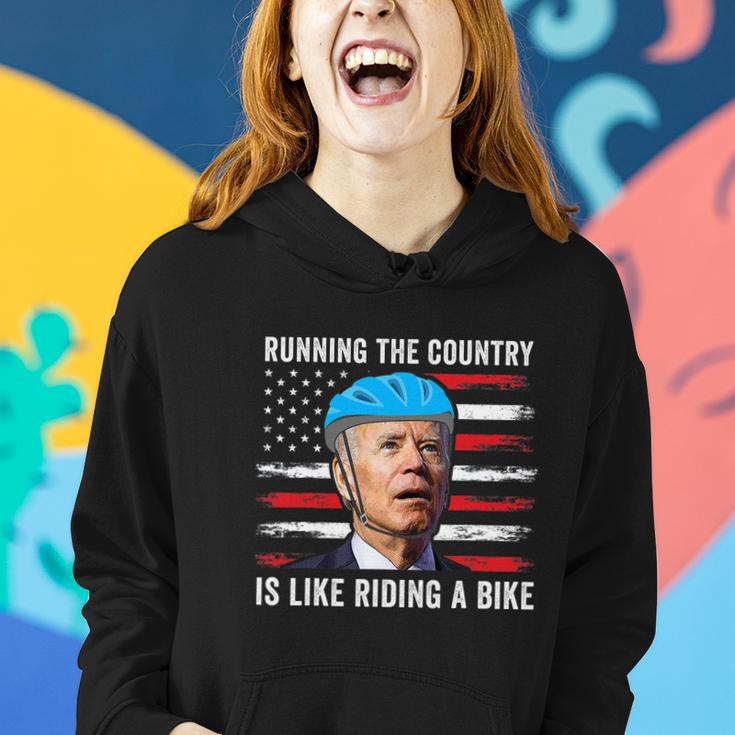 Joe Biden Falling Off His Bicycle Funny Biden Falls Off Bike America Flag Women Hoodie Gifts for Her