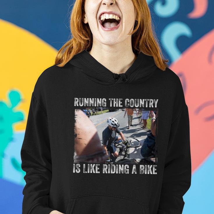 Running The Country Is Like Riding A Bike Joe Biden Funny Design Anti Biden Women Hoodie Gifts for Her