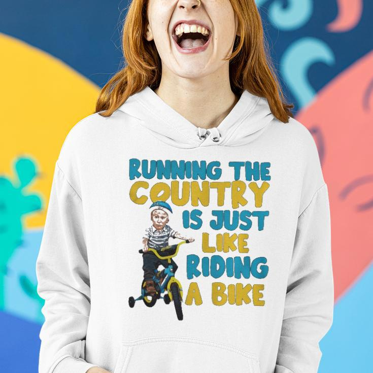Joe Biden Running The Country Is Like Riding A Bike Women Hoodie Gifts for Her
