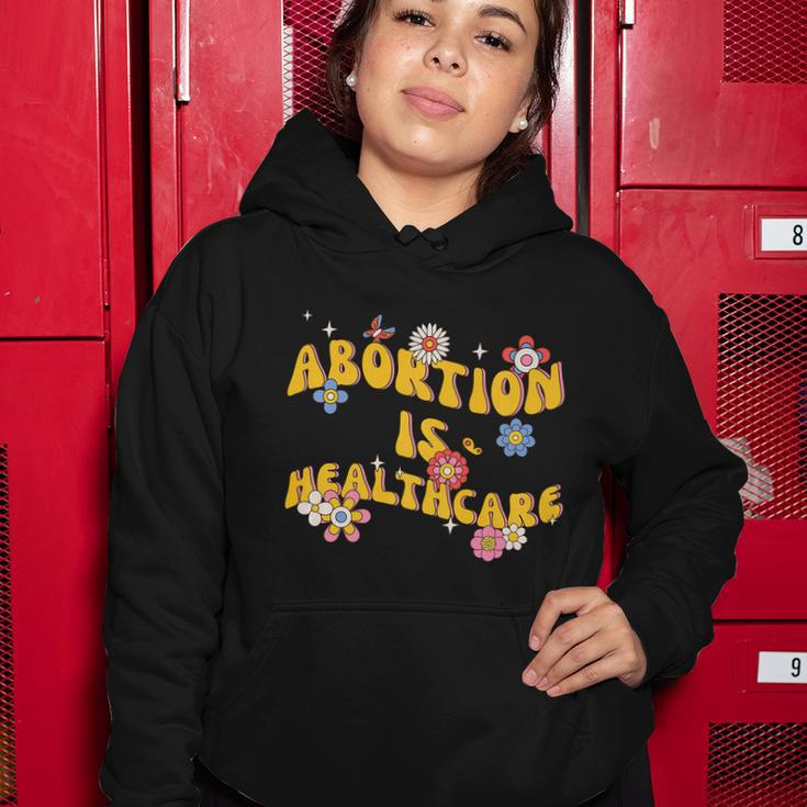 Abortion Is Healthcare Retro Floral Pro Choice Feminist Women Hoodie Unique Gifts