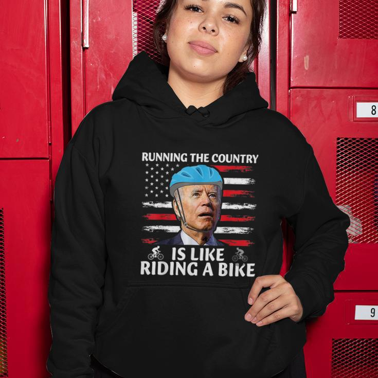 Running The Country Is Like Riding A Bike Joe Biden Funny Meme Women Hoodie Unique Gifts