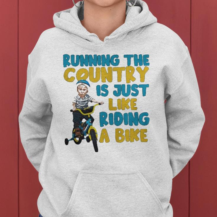 Joe Biden Running The Country Is Like Riding A Bike Women Hoodie
