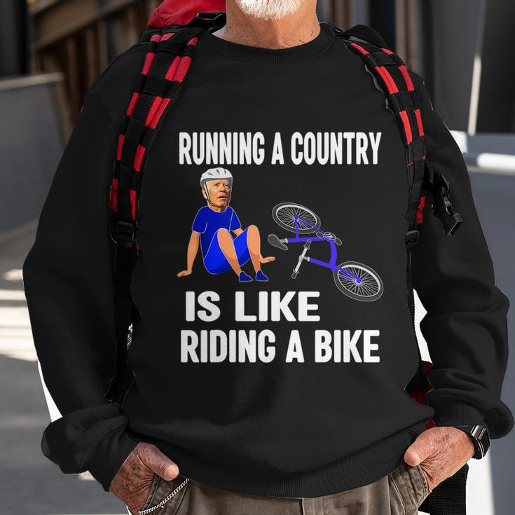 Biden Falls Off Bike Joe Biden Falling Off His Bicycle Funny Meme Sweatshirt Gifts for Old Men