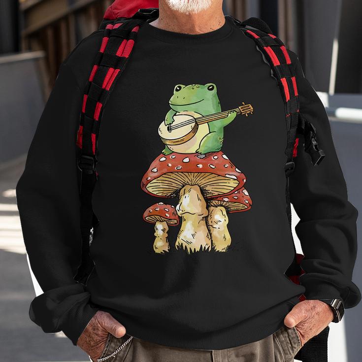 Frog Playing Banjo On Mushroom Cute Cottagecore Aesthetic Sweatshirt Gifts for Old Men