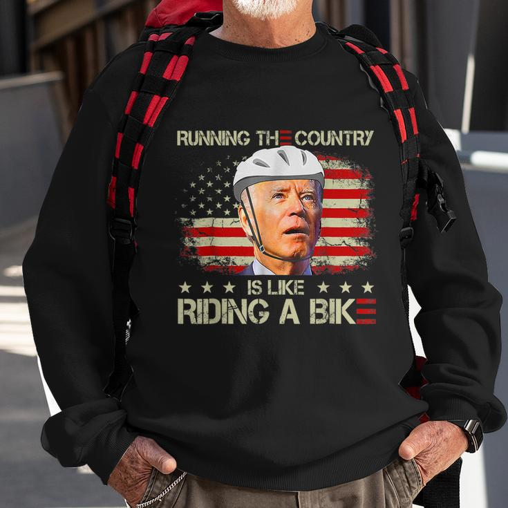 Joe Biden Falling Off Bike Running The Country Is Like Riding A Bike V2 Sweatshirt Gifts for Old Men