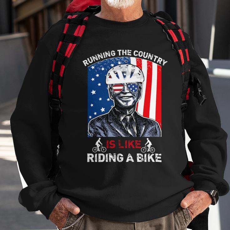 Joe Biden Falling Off His Bicycle Funny Biden Falls Off Bike V7 Sweatshirt Gifts for Old Men