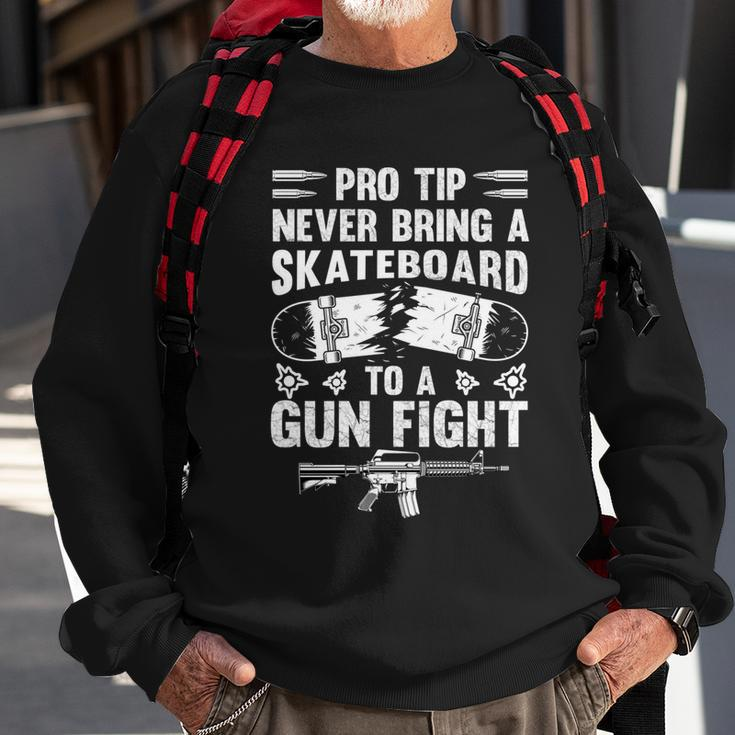 Pro Tip Never Bring A Skateboard To A Gunfight Funny Pro A Sweatshirt Gifts for Old Men