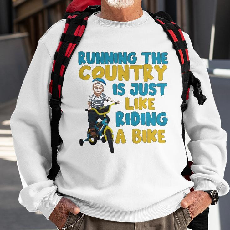 Joe Biden Running The Country Is Like Riding A Bike Sweatshirt Gifts for Old Men