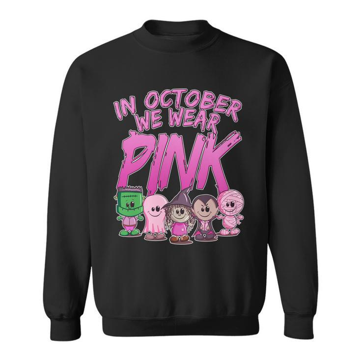 In October We Wear Pink Breast Cancer Halloween Monsters Sweatshirt