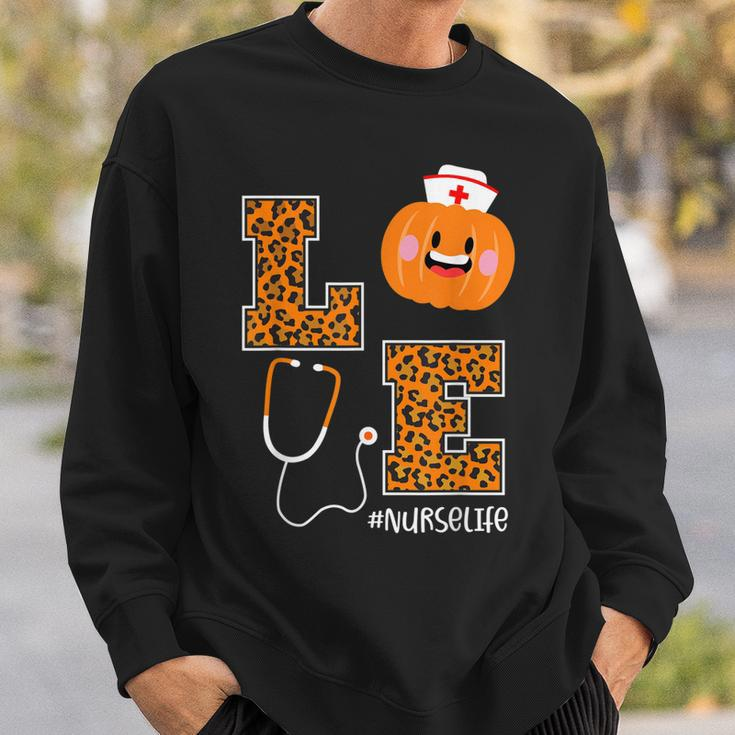 Love Nurse Life Pumpkin Leopard Fall Halloween Nurses Sweatshirt Gifts for Him