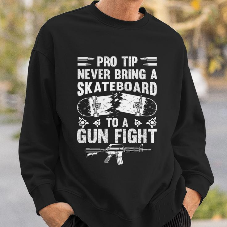 Pro Tip Never Bring A Skateboard To A Gunfight Funny Pro A Sweatshirt Gifts for Him