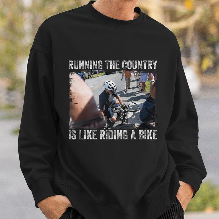 Running The Country Is Like Riding A Bike Joe Biden Funny Design Anti Biden Sweatshirt Gifts for Him