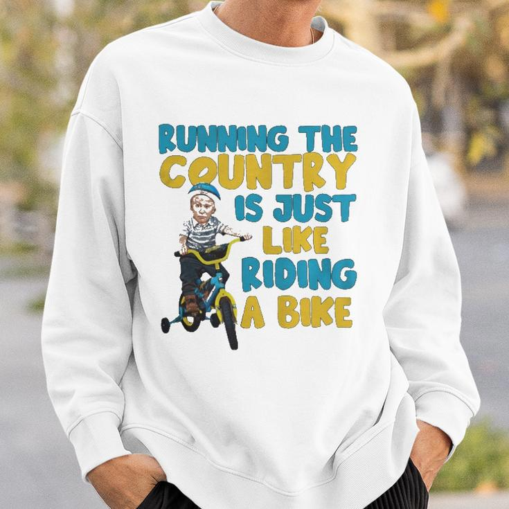 Joe Biden Running The Country Is Like Riding A Bike Sweatshirt Gifts for Him