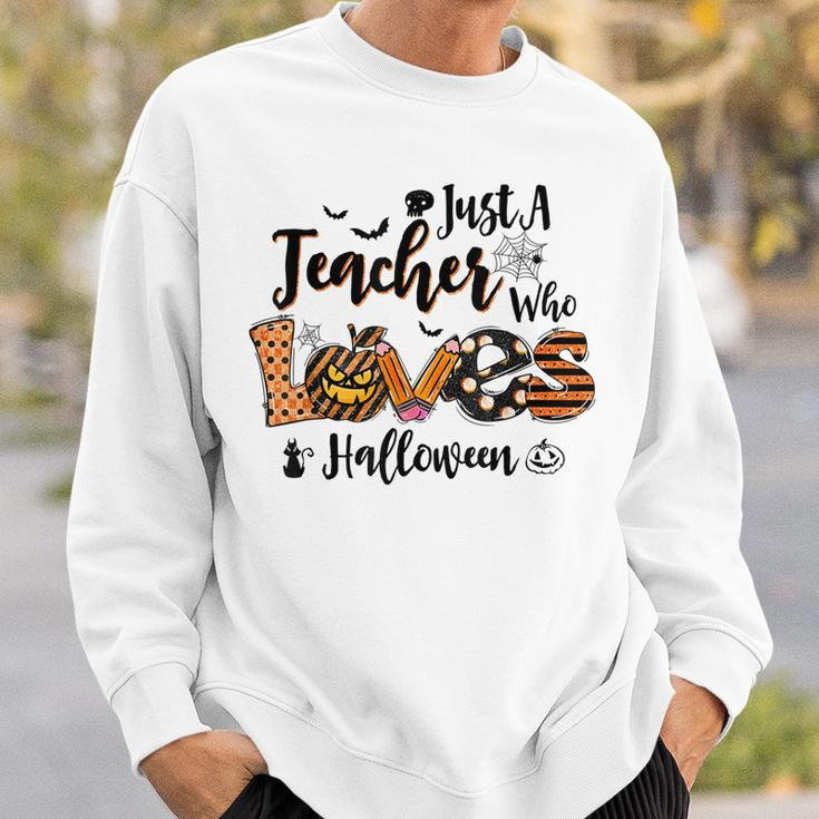 Just A Teacher Who Loves Halloween Pumpkin Witch Costume Sweatshirt Gifts for Him