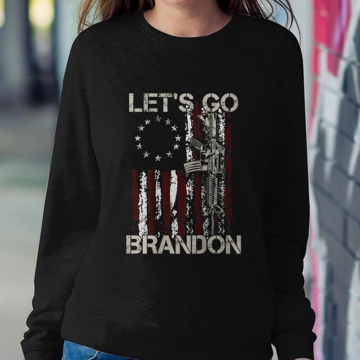 Gun American Flag Patriots Lets Go Brandon On Back Sweatshirt Gifts for Her