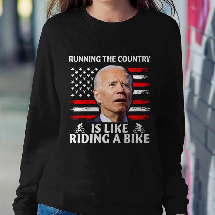 Joe Biden Falling Off Bike Running The Country Is Like Riding A Bike V3 Sweatshirt Gifts for Her