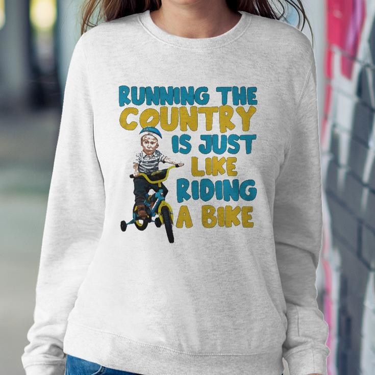 Joe Biden Running The Country Is Like Riding A Bike Sweatshirt Gifts for Her