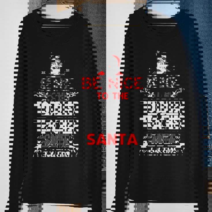 Be Nice To The Toddler Teacher Santa Is Watching Sweatshirt Gifts for Old Women