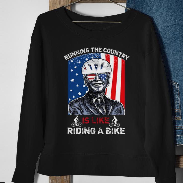 Joe Biden Falling Off His Bicycle Funny Biden Falls Off Bike V7 Sweatshirt Gifts for Old Women