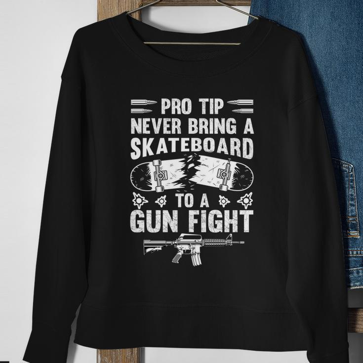 Pro Tip Never Bring A Skateboard To A Gunfight Funny Pro A Sweatshirt Gifts for Old Women