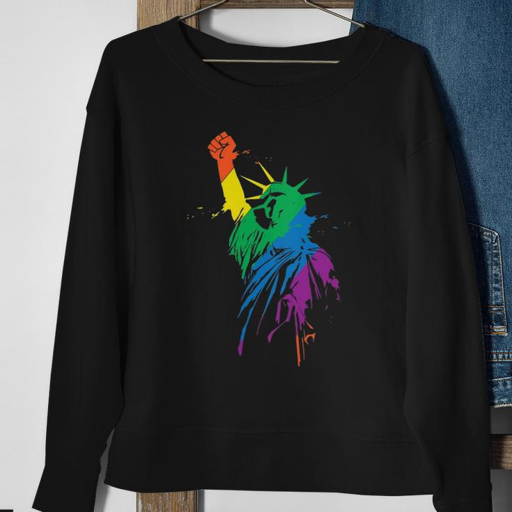 Womens Rainbow Statue Of Liberty With Raised Fist Lgbtq Pride Sweatshirt Gifts for Old Women