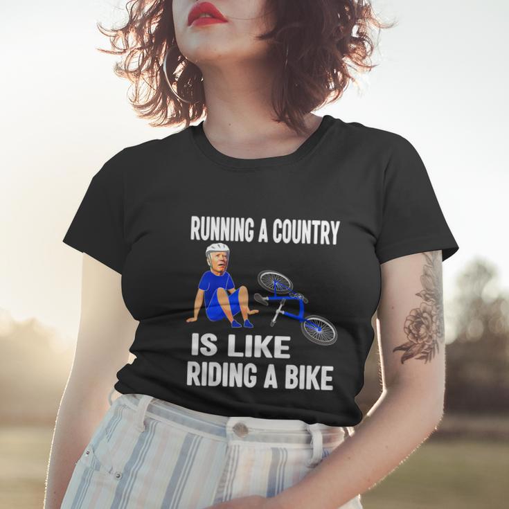 Biden Falls Off Bike Joe Biden Falling Off His Bicycle Funny V3 Women T-shirt Gifts for Her