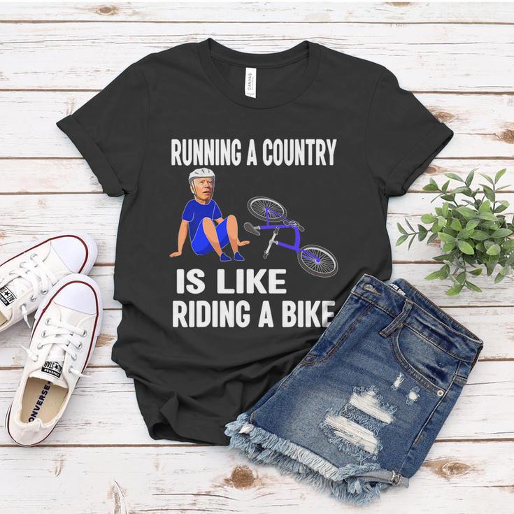 Biden Falls Off Bike Joe Biden Falling Off His Bicycle Funny Biden Women T-shirt Unique Gifts