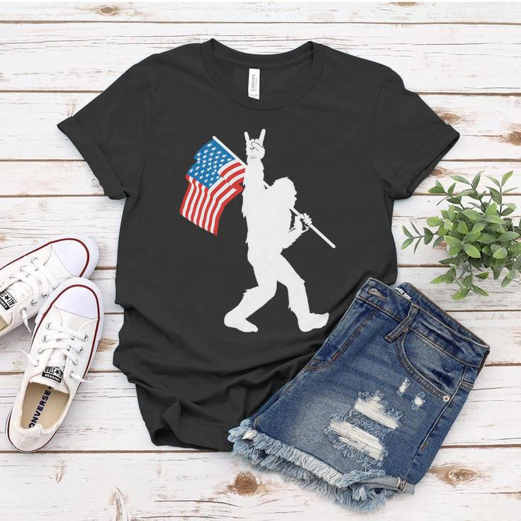 Funny Bigfoot 4Th Of July Rock And Roll Usa Flag For Sasquatch Believers Women T-shirt Unique Gifts