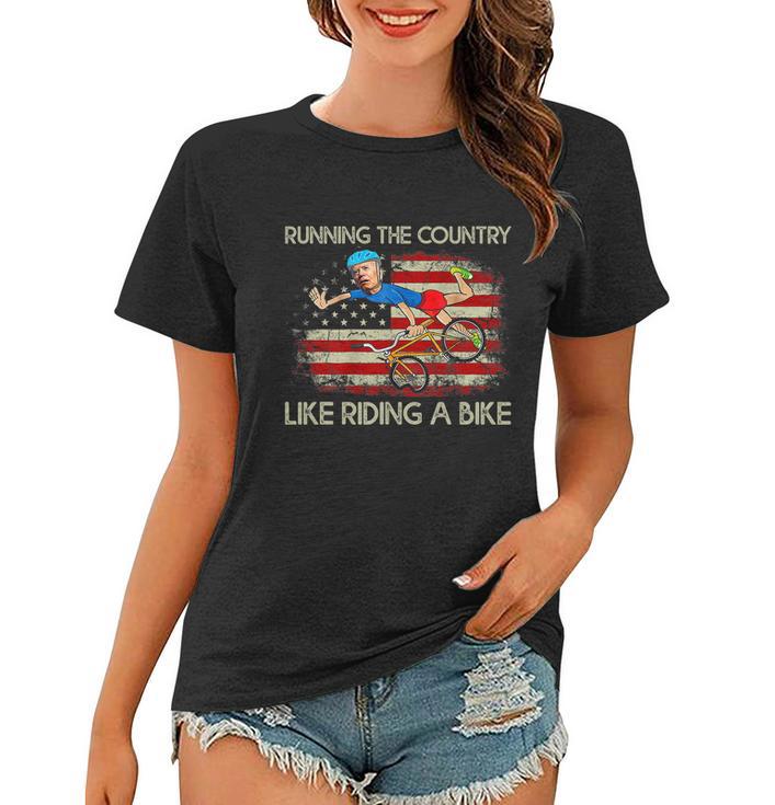 Biden Falls Off Bike Joe Biden Falling Off His Bicycle America Flag Women T-shirt