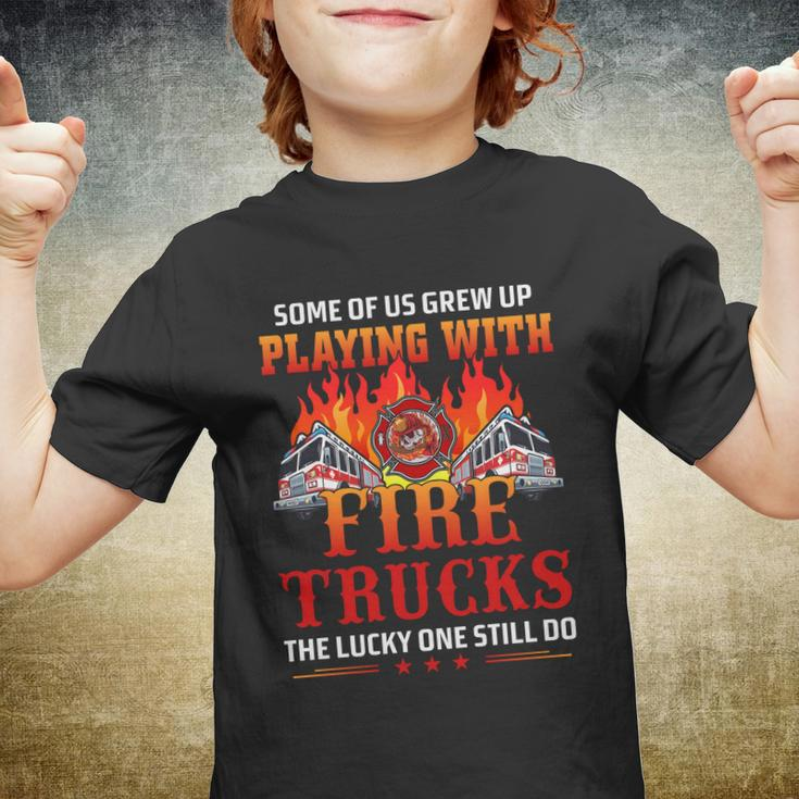 Some Of Us Grew Up Playing With Fire Trucks The Lucky One Still Do Youth T-shirt